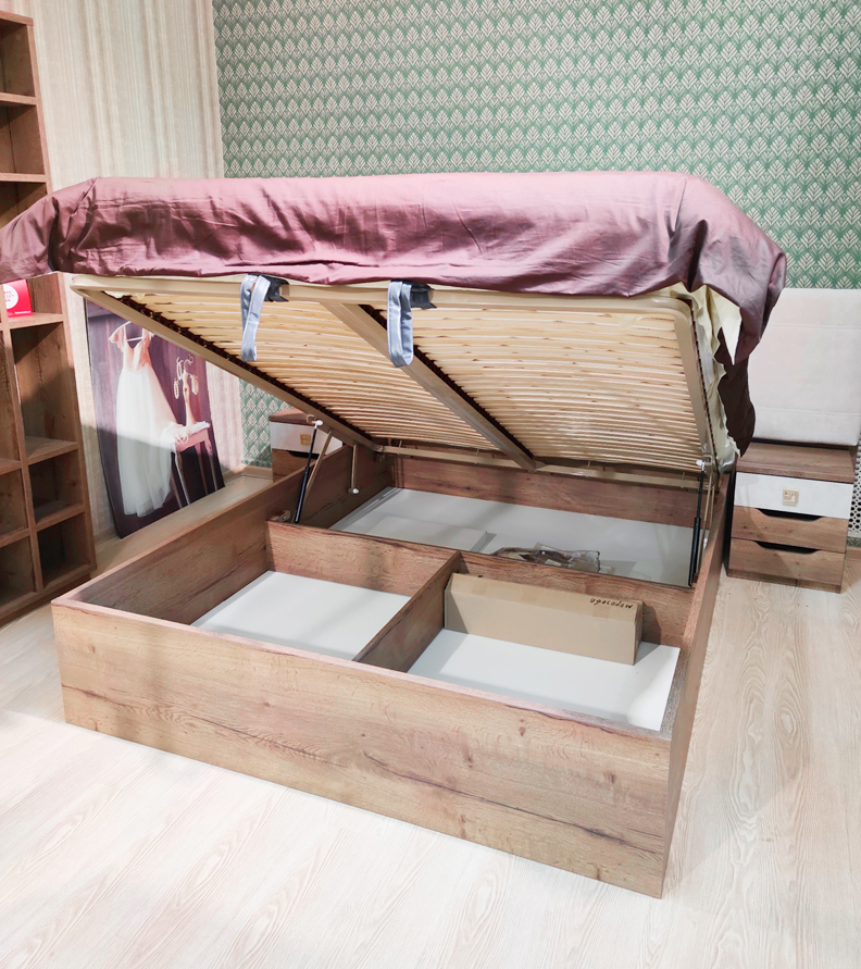 Кровать с мягким изголовьем (элементом) и подъемным механизмом